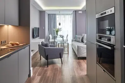 Kuchnia lub aneks kuchenny w obiekcie Rydygiera 16-18 by Homeprime