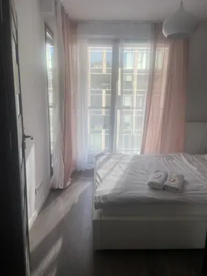 Łóżko lub łóżka w pokoju w obiekcie Platinum Towers Apartments
