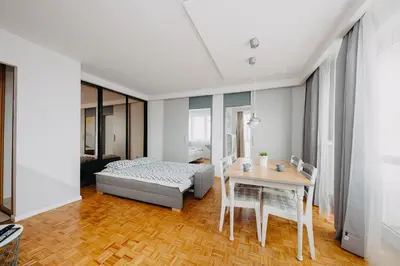 Łóżko lub łóżka w pokoju w obiekcie ShortStayPoland Aleje Jerozolimskie (B4)