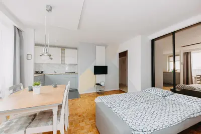 Łóżko lub łóżka w pokoju w obiekcie ShortStayPoland Aleje Jerozolimskie (B4)