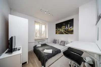 Telewizja i/lub zestaw kina domowego w obiekcie 6 Cities Rooms