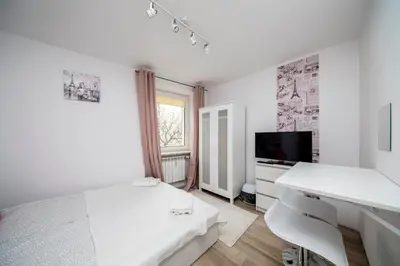 Telewizja i/lub zestaw kina domowego w obiekcie 6 Cities Rooms