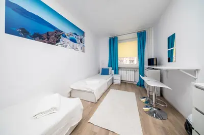 Telewizja i/lub zestaw kina domowego w obiekcie 6 Cities Rooms