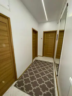 Łóżko lub łóżka w pokoju w obiekcie Ogrodowa Apartments