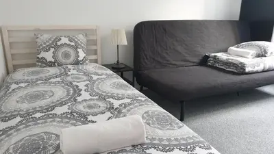 Łóżko lub łóżka w pokoju w obiekcie ALDAMI