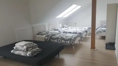 Łóżko lub łóżka w pokoju w obiekcie ALDAMI