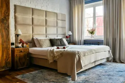 Łóżko lub łóżka w pokoju w obiekcie ARTHOTEL STALOWA 52