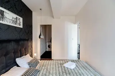 Łóżko lub łóżka w pokoju w obiekcie Luxury apartment in the Old town Warsaw