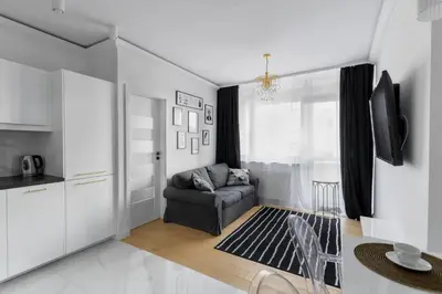 Część wypoczynkowa w obiekcie Grand Theatre Prime Apartment by BookingHost