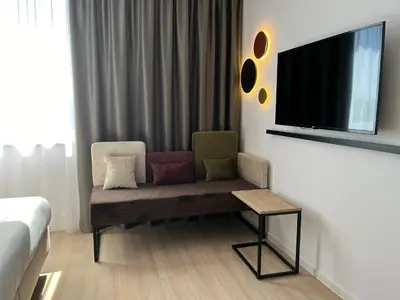 Telewizja i/lub zestaw kina domowego w obiekcie Campanile Warszawa Północ