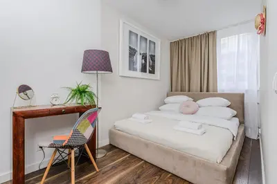 Łóżko lub łóżka w pokoju w obiekcie Grzybowska 5 by P&O Serviced Apartments