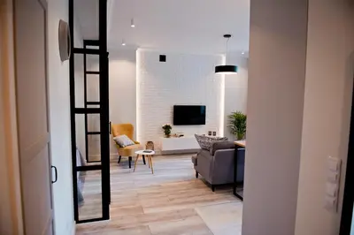 Telewizja i/lub zestaw kina domowego w obiekcie Apartment next to the Old Town & Krasinski garden
