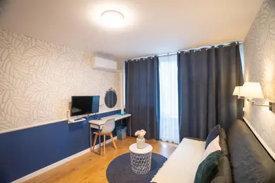 Telewizja i/lub zestaw kina domowego w obiekcie Apartament Hotel Grzybowska 9