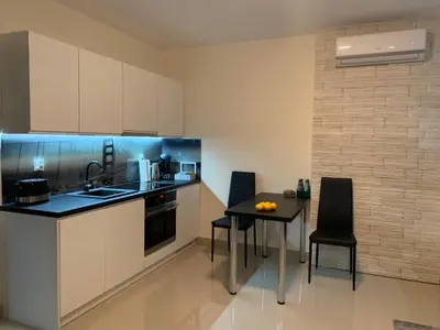 Kuchnia lub aneks kuchenny w obiekcie Aparthotel Koroni Home