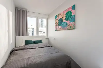 Łóżko lub łóżka w pokoju w obiekcie Chill Apartments Pańska
