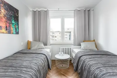 Łóżko lub łóżka w pokoju w obiekcie Chill Apartments Pańska