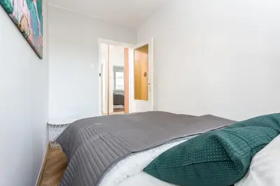 Łóżko lub łóżka w pokoju w obiekcie Chill Apartments Pańska