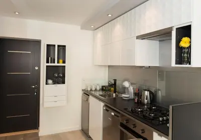 Kuchnia lub aneks kuchenny w obiekcie Warsawrent Apartamenty Centralna