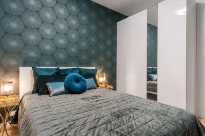 Łóżko lub łóżka w pokoju w obiekcie Mennica Residence Chic Apartment by BookingHost