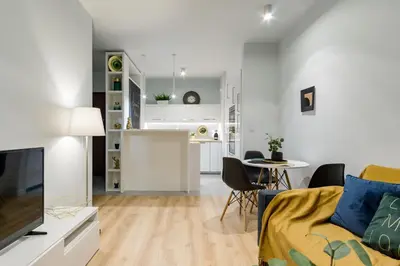 Kuchnia lub aneks kuchenny w obiekcie Mennica Residence Chic Apartment by BookingHost