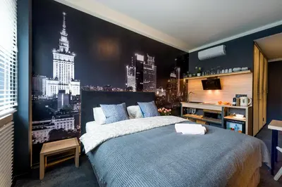 Łóżko lub łóżka w pokoju w obiekcie My Beloved Warsaw