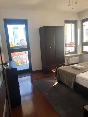 Łóżko lub łóżka w pokoju w obiekcie Apartament H&P Silver