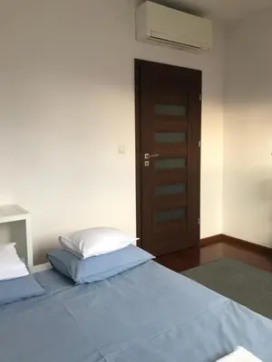 Łóżko lub łóżka w pokoju w obiekcie Apartament H&P Silver