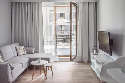 Telewizja i/lub zestaw kina domowego w obiekcie Varsovia Apartments Jaktorowska