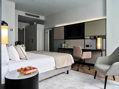Łóżko lub łóżka w pokoju w obiekcie Leonardo Royal Hotel Warsaw
