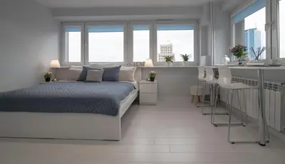 Łóżko lub łóżka w pokoju w obiekcie WLR Apartments - Świętokrzyska I