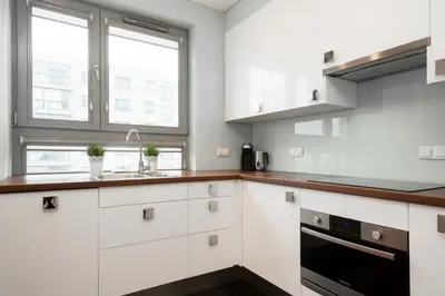 Kuchnia lub aneks kuchenny w obiekcie Warsaw Promenada Family Apartment by Noclegi Renters