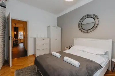Łóżko lub łóżka w pokoju w obiekcie ShortStayPoland Marszałkowska (B28)