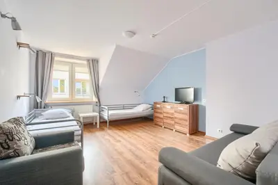 Część wypoczynkowa w obiekcie Stara Praga Krokodyl Warsaw Rooms&Dorms-Praga Południe