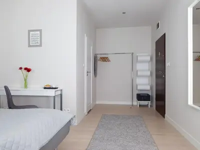 Łóżko lub łóżka w pokoju w obiekcie Chopin Apartments - Eco
