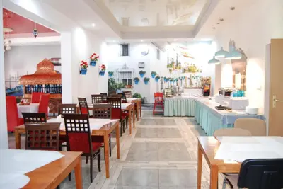 Restauracja lub miejsce do jedzenia w obiekcie Amigo Hotel