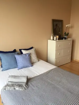 Łóżko lub łóżka w pokoju w obiekcie Gdańska 3