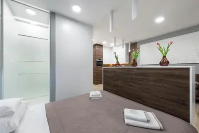 Łóżko lub łóżka w pokoju w obiekcie Apartament Luxury Miedzyborska 8b