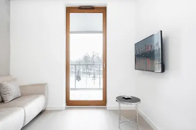 Telewizja i/lub zestaw kina domowego w obiekcie Apartments Warsaw Szamocka by Renters Prestige