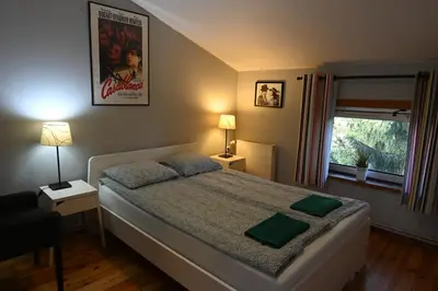 Łóżko lub łóżka w pokoju w obiekcie Pepe Hostel