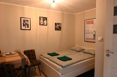 Łóżko lub łóżka w pokoju w obiekcie Pepe Hostel