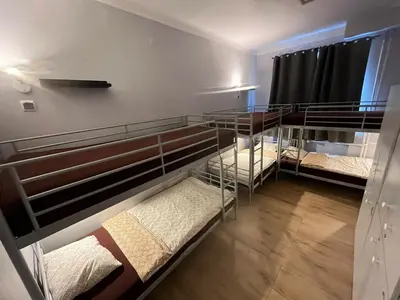 Łóżko lub łóżka w pokoju w obiekcie Jasna Hostelik self check-in