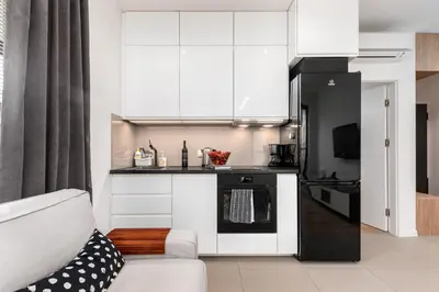 Kuchnia lub aneks kuchenny w obiekcie BG Apartments Grzybowska