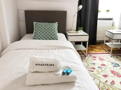 Łóżko lub łóżka w pokoju w obiekcie Podwale 29 by Homeprime