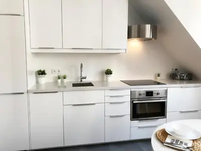 Kuchnia lub aneks kuchenny w obiekcie Podwale 29 by Homeprime