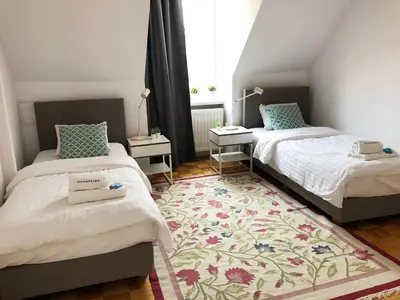 Łóżko lub łóżka w pokoju w obiekcie Podwale 29 by Homeprime