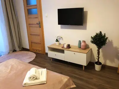 Łóżko lub łóżka w pokoju w obiekcie Aleja 3 maja 7 by Homeprime