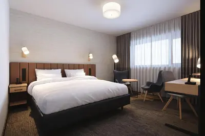 Łóżko lub łóżka w pokoju w obiekcie Four Points by Sheraton Warsaw Mokotow