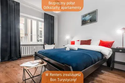 Łóżko lub łóżka w pokoju w obiekcie Apartments Monte Carlo Warsaw by Noclegi Renters
