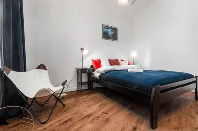 Łóżko lub łóżka w pokoju w obiekcie Apartments Monte Carlo Warsaw by Noclegi Renters