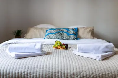 Łóżko lub łóżka w pokoju w obiekcie MIODOWA Street P&O Serviced Apartments